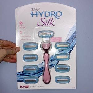 Hydro Silk brand new in box razors. Handle plus 9 replacement blades.